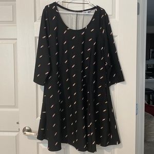 Plus Size A-Line Scoop Neck Dress. Lipstick print. 3/4 Sleeves. Zipper detail.